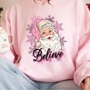 Ugly Christmas Sweater sweatshirt Santa graphic ‘Believe’ pink size large